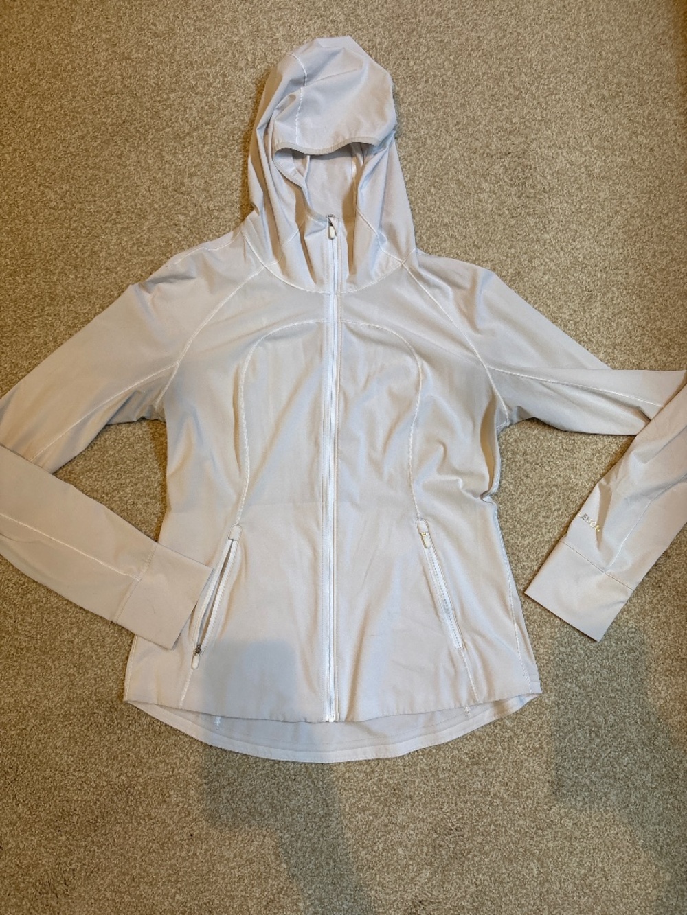 Lululemon light weight jacket, size 10, white